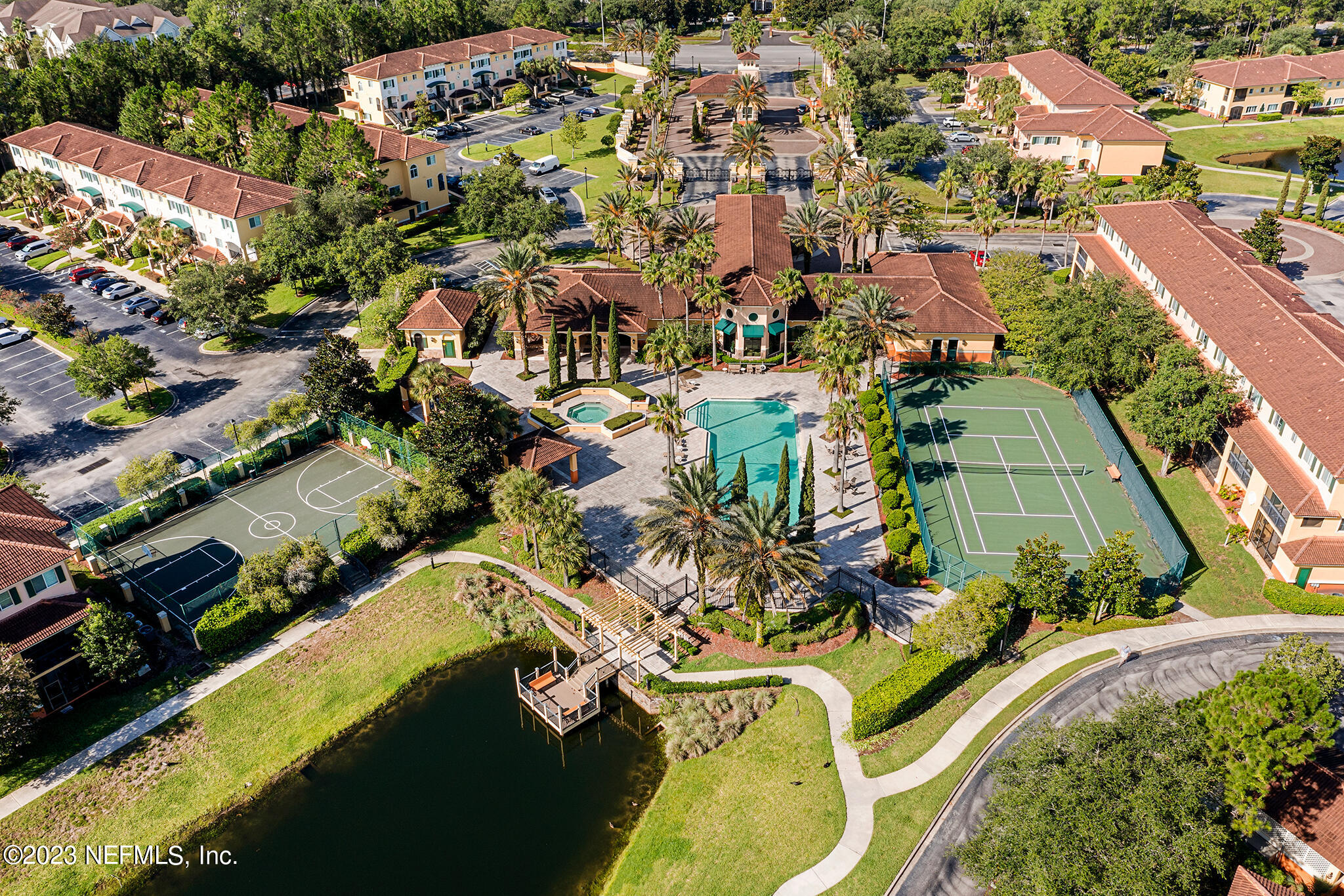 9745 Touchton Road, Unit 2003 Jacksonville, FL 32246 - Photo 1 of 34 an aerial view of residential houses with outdoor space