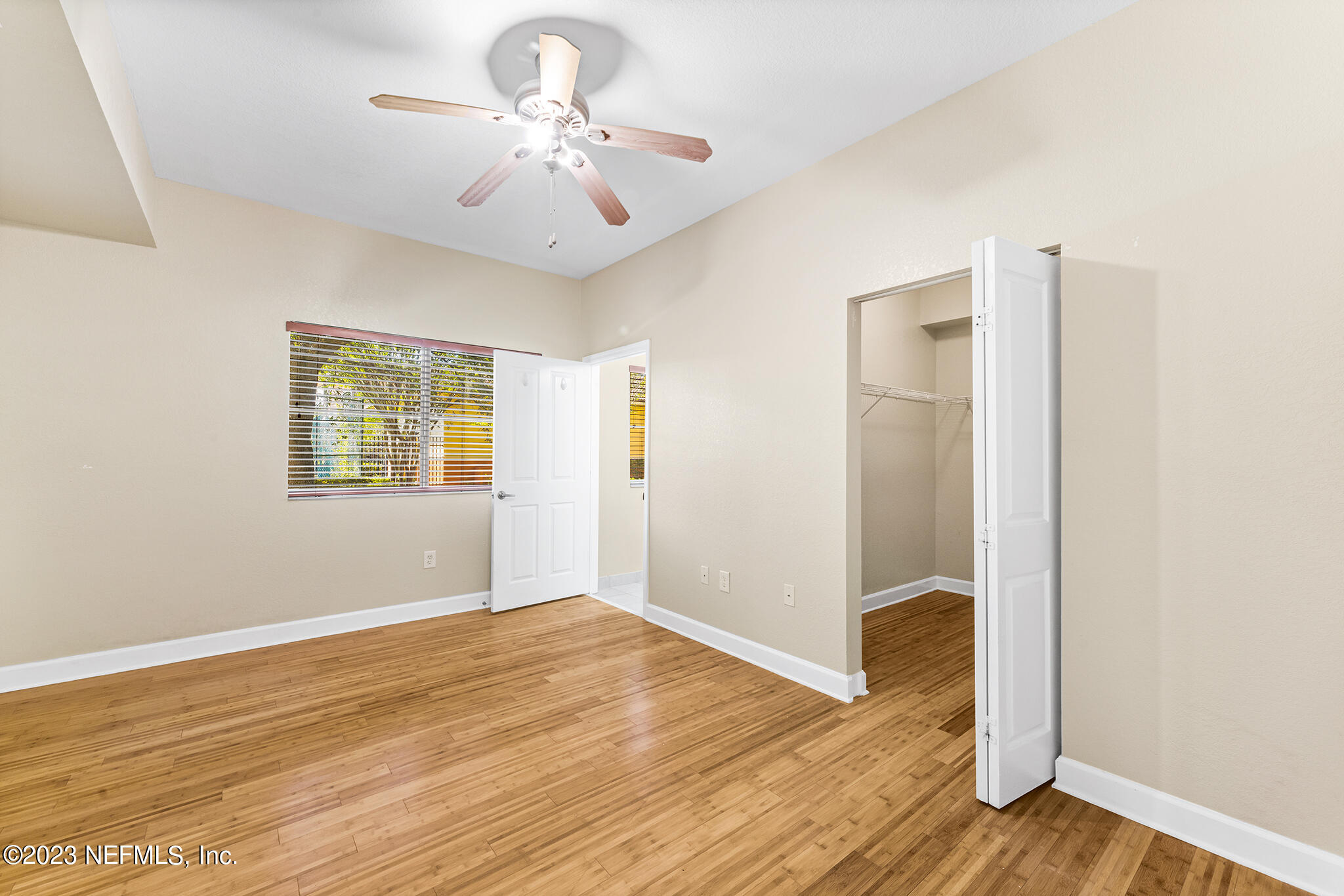 9745 Touchton Road, Unit 2003 Jacksonville, FL 32246 - Photo 15 of 34 a view of an empty room with wooden floor