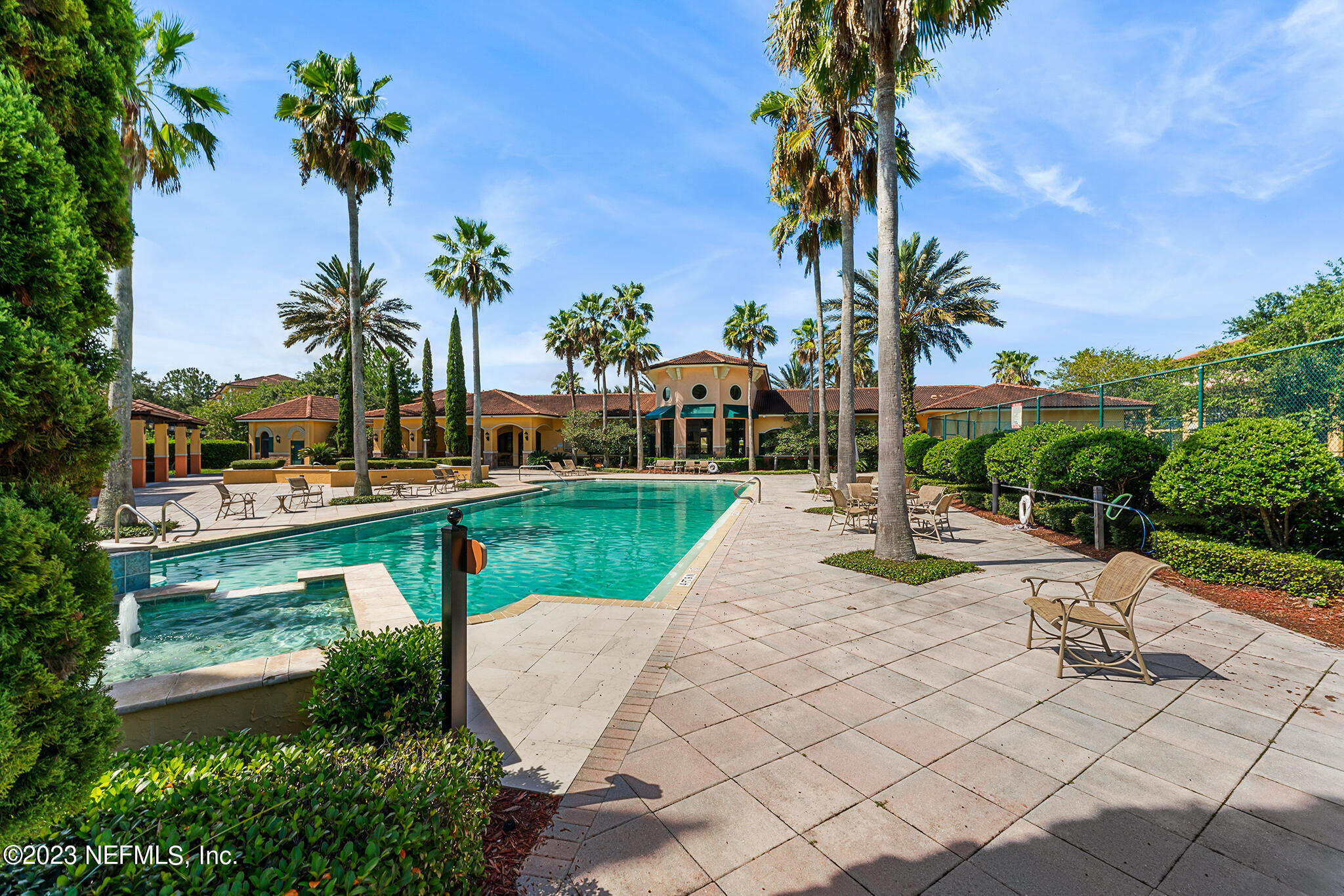 9745 Touchton Road, Unit 2003 Jacksonville, FL 32246 - Photo 29 of 34 a view of a swimming pool with lounge chairs