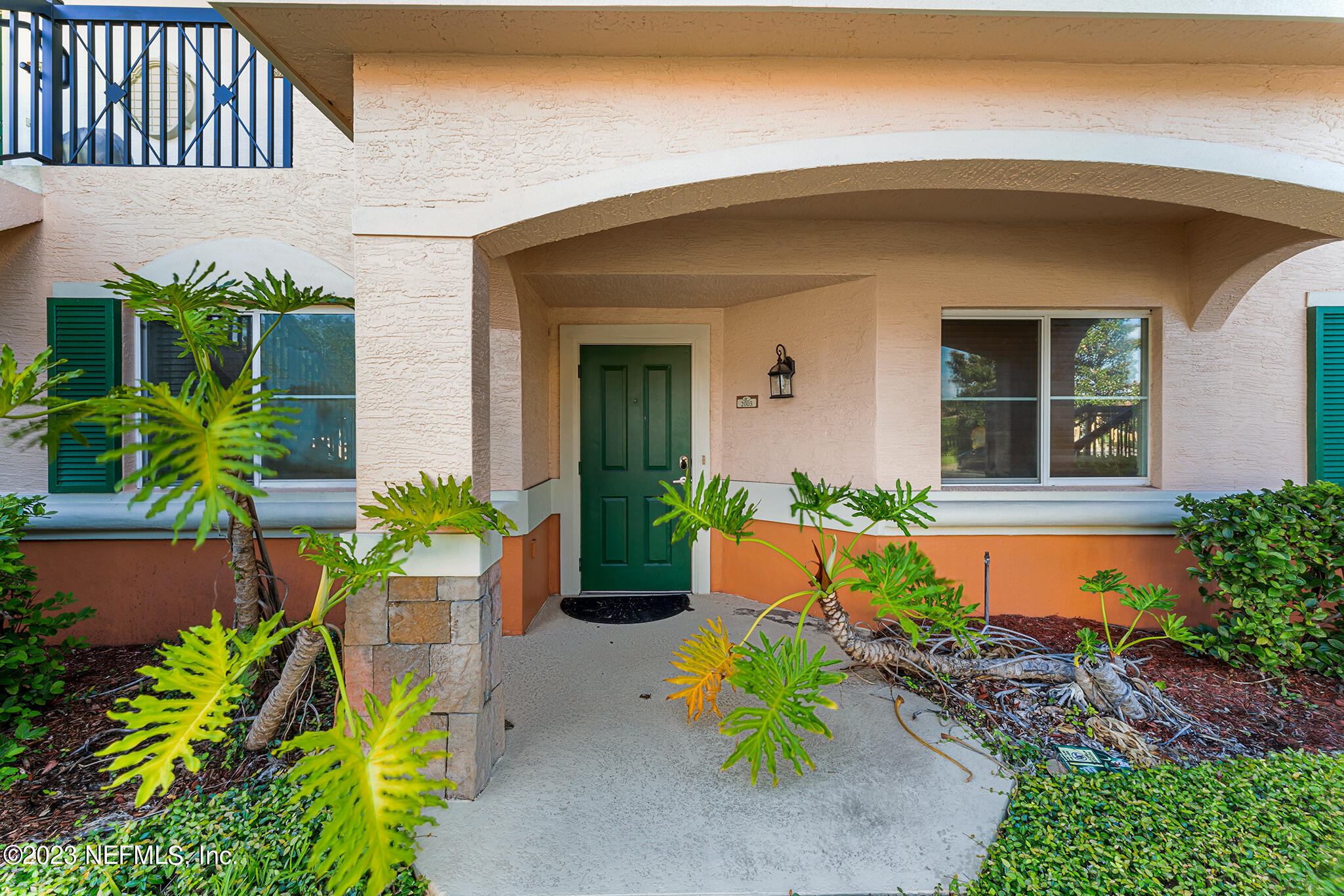 9745 Touchton Road, Unit 2003 Jacksonville, FL 32246 - Photo 33 of 34 a front view of a house with a yard