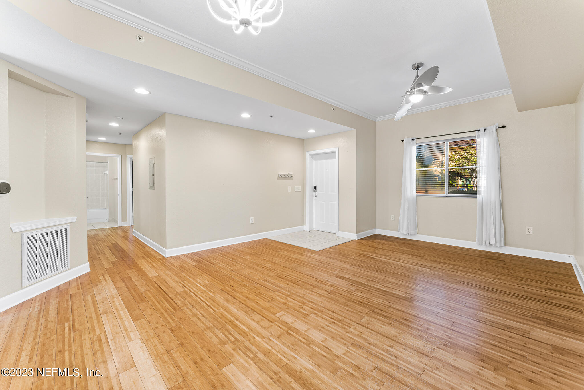 9745 Touchton Road, Unit 2003 Jacksonville, FL 32246 - Photo 6 of 34 a view of empty room with wooden floor