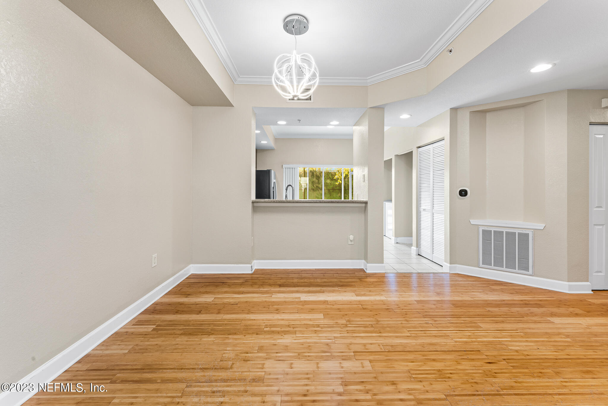 9745 Touchton Road, Unit 2003 Jacksonville, FL 32246 - Photo 9 of 34 a view of a livingroom with wooden floor