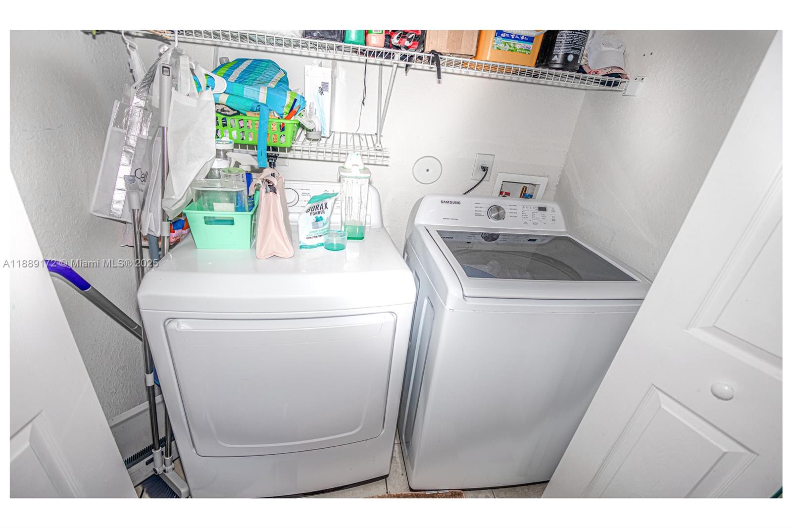 18272 Southwest 108th Path Miami, FL 33157 - Photo 23 of 27 a utility room with dryer and washer