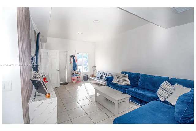 a living room with furniture and a couch