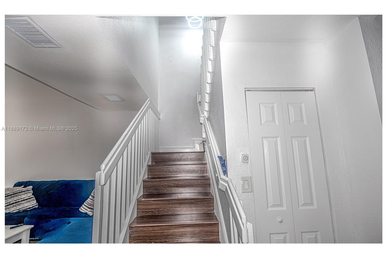 18272 Southwest 108th Path Miami, FL 33157 - Photo 9 of 27 a view of entryway and hall with wooden floor