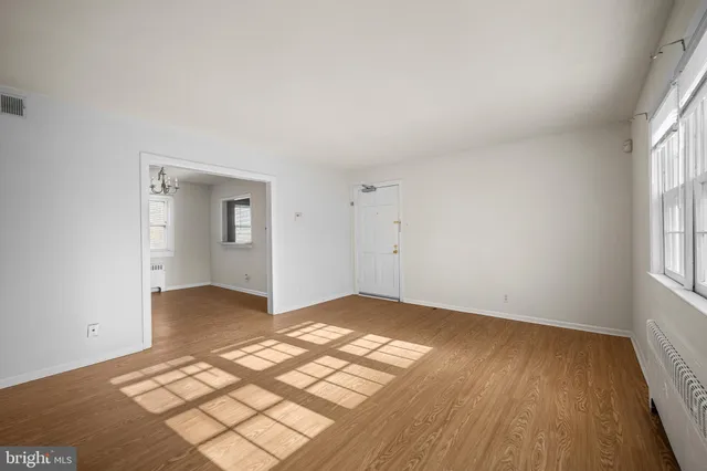 a view of an empty room and window