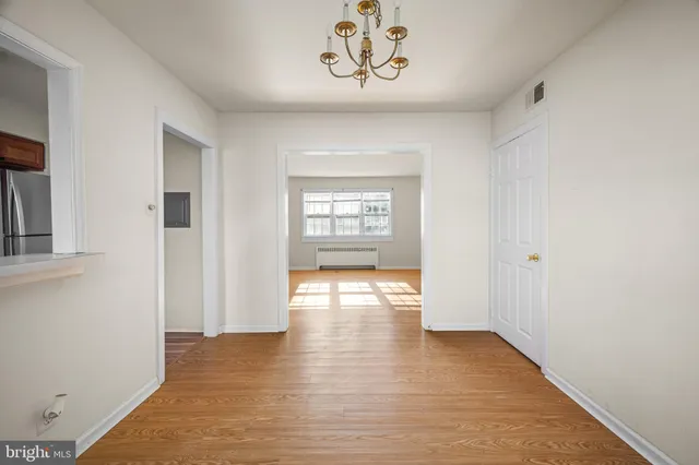 a view of an empty room and window