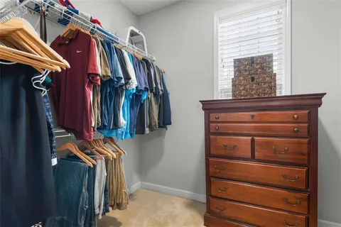 a room with furniture and a window