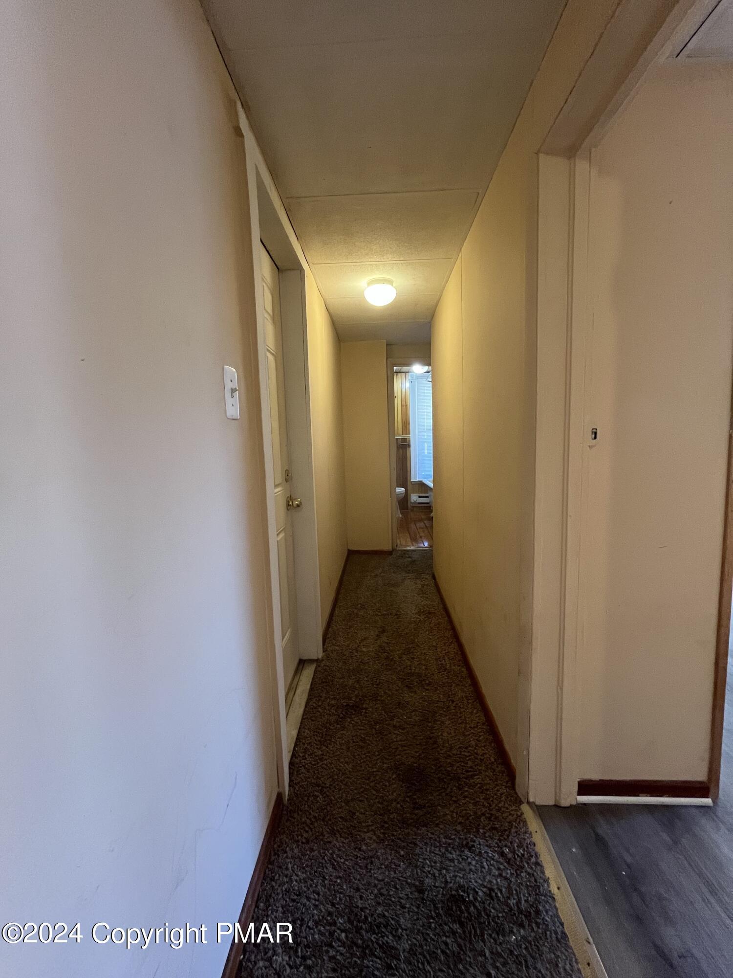 501 North Railroad Street Tamaqua, PA 18252 - Photo 5 of 7 a view of hallway with wooden floor