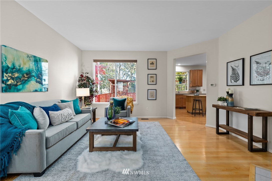 459 Field Place Northeast Renton, WA 98059 - Photo 4 of 40 a living room with furniture and a window