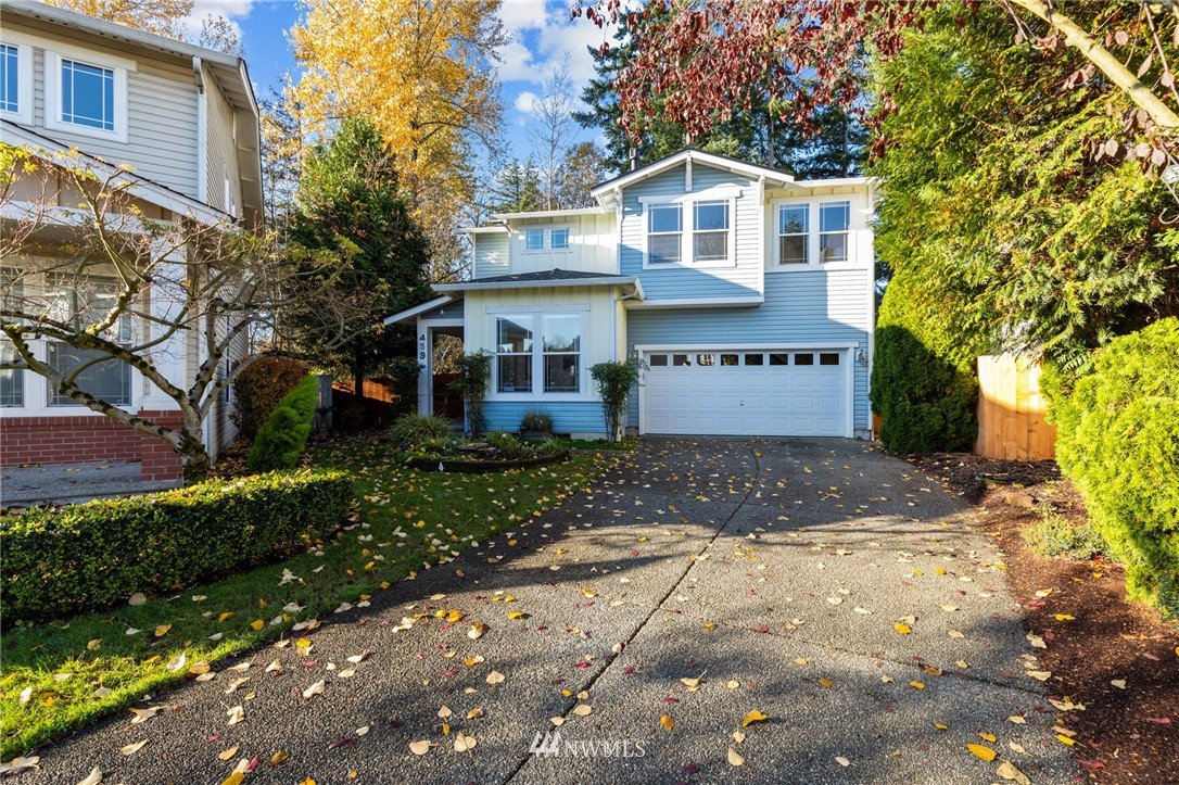 459 Field Place Northeast Renton, WA 98059 - Photo 40 of 40 a front view of a house with a yard and garage
