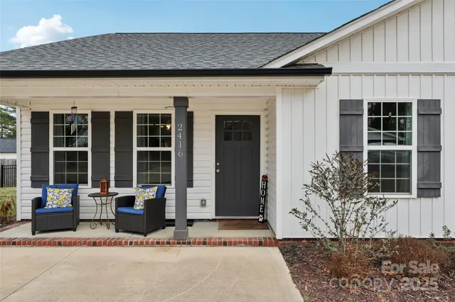 a front view of a house with a patio