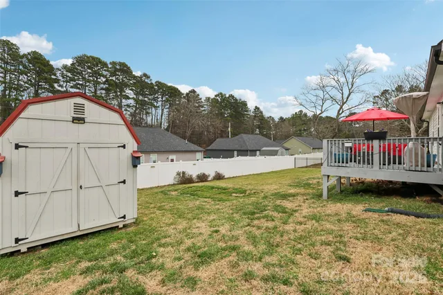 a view of a wrought iron fences in front of house