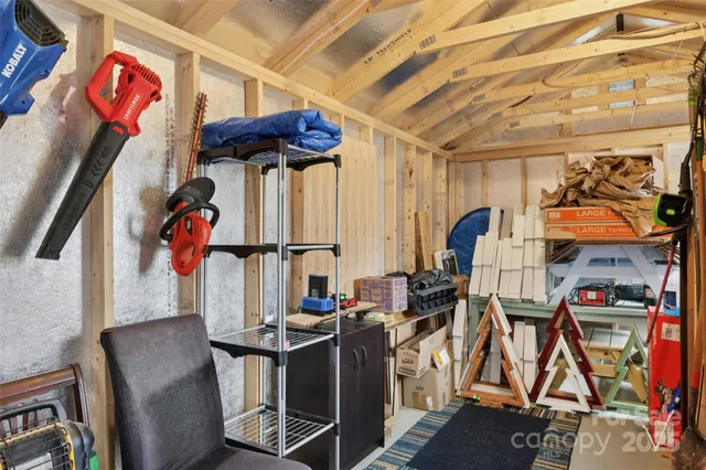 a view of gym equipment and utility room