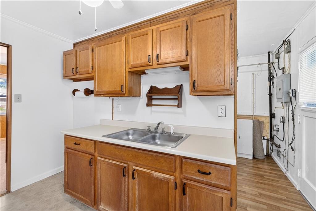 1660 The Circle Washington, PA 15301 - Photo 11 of 50 a kitchen with stainless steel appliances granite countertop a sink refrigerator and cabinets