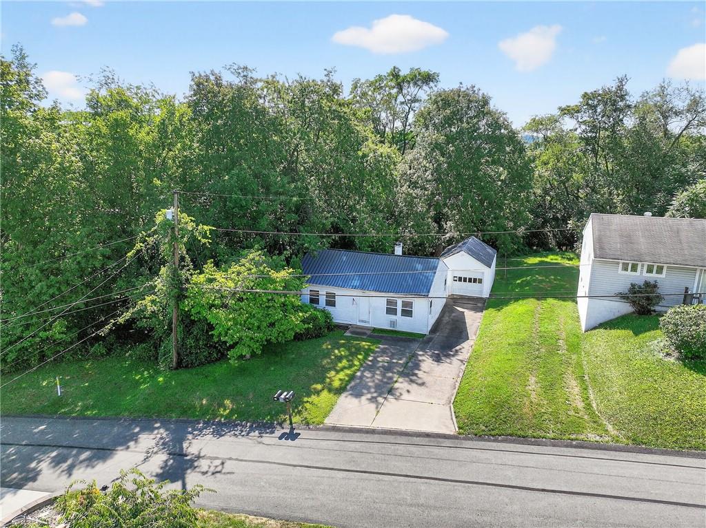 1660 The Circle Washington, PA 15301 - Photo 44 of 50 an aerial view of a house with garden space and street view