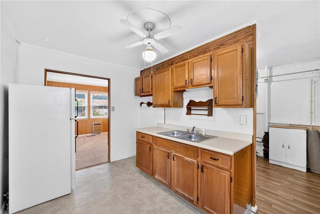 1660 The Circle Washington, PA 15301 - Photo 10 of 50 a kitchen with stainless steel appliances granite countertop a sink stove and cabinets