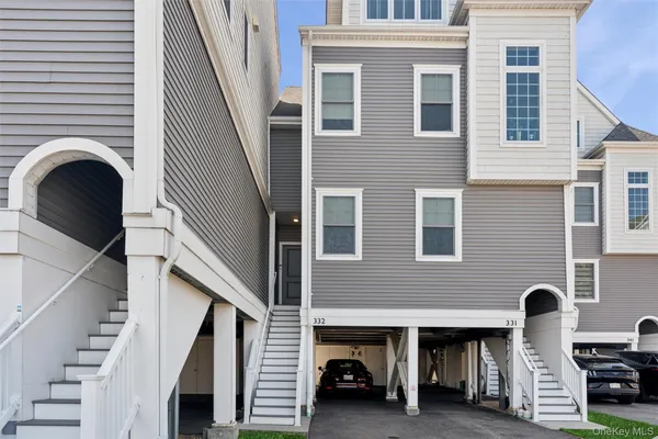 $699,000 | 332 Marina Pointe Drive, Unit 332, East Rockaway, NY 11518
