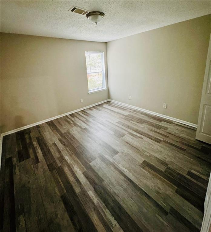 2074 Oak Park Lane Decatur, GA 30032 - Photo 9 of 17 a view of an empty room and window