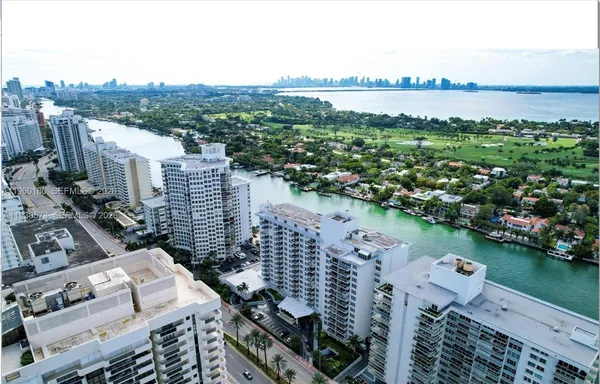 a view of a city and lake