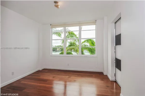 a view of an empty room with window