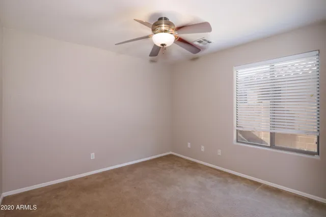 view of a hallway with two rooms