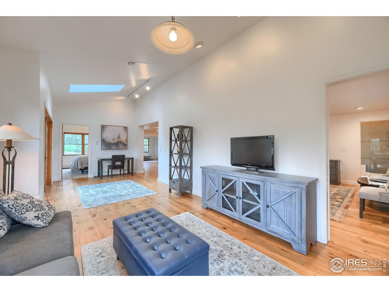 5163 Independence Road Boulder, CO 80301 - Photo 12 of 39 living into primary bedroom