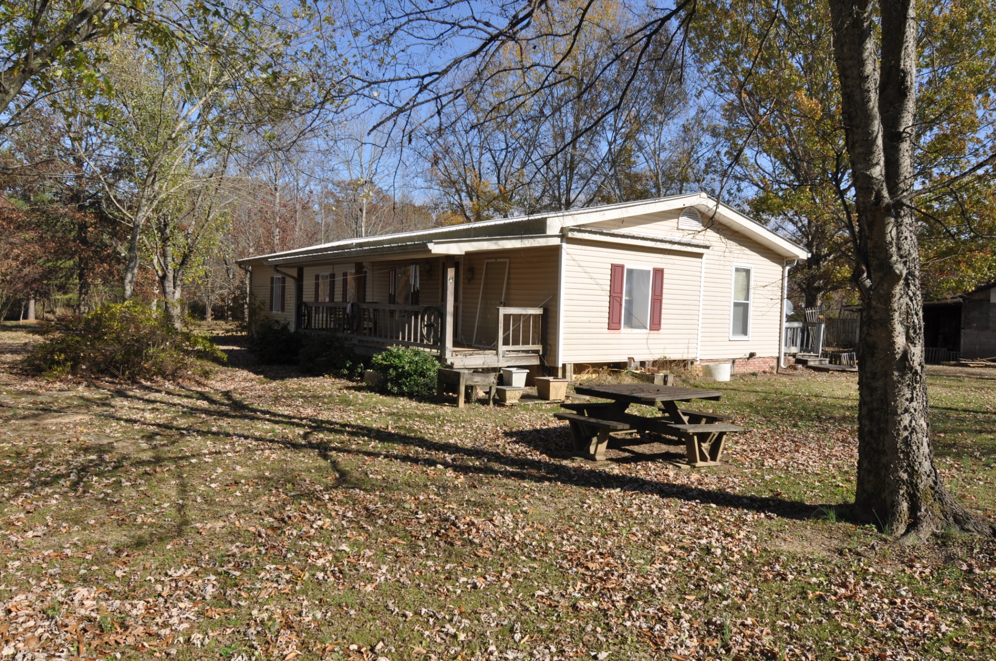 238 Putman Well Road Rockvale, TN 37153 - Photo 1 of 42 a backyard of a house with yard and outdoor seating
