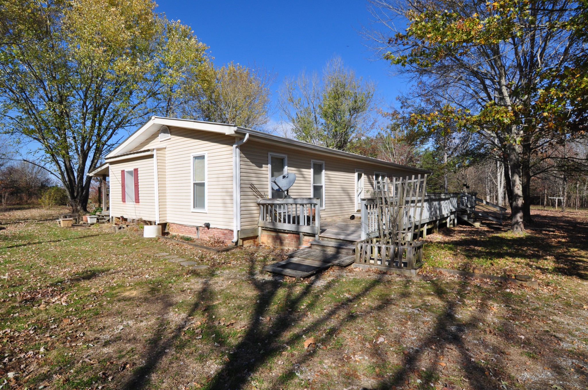 238 Putman Well Road Rockvale, TN 37153 - Photo 2 of 42 a view of a house with backyard and sitting area