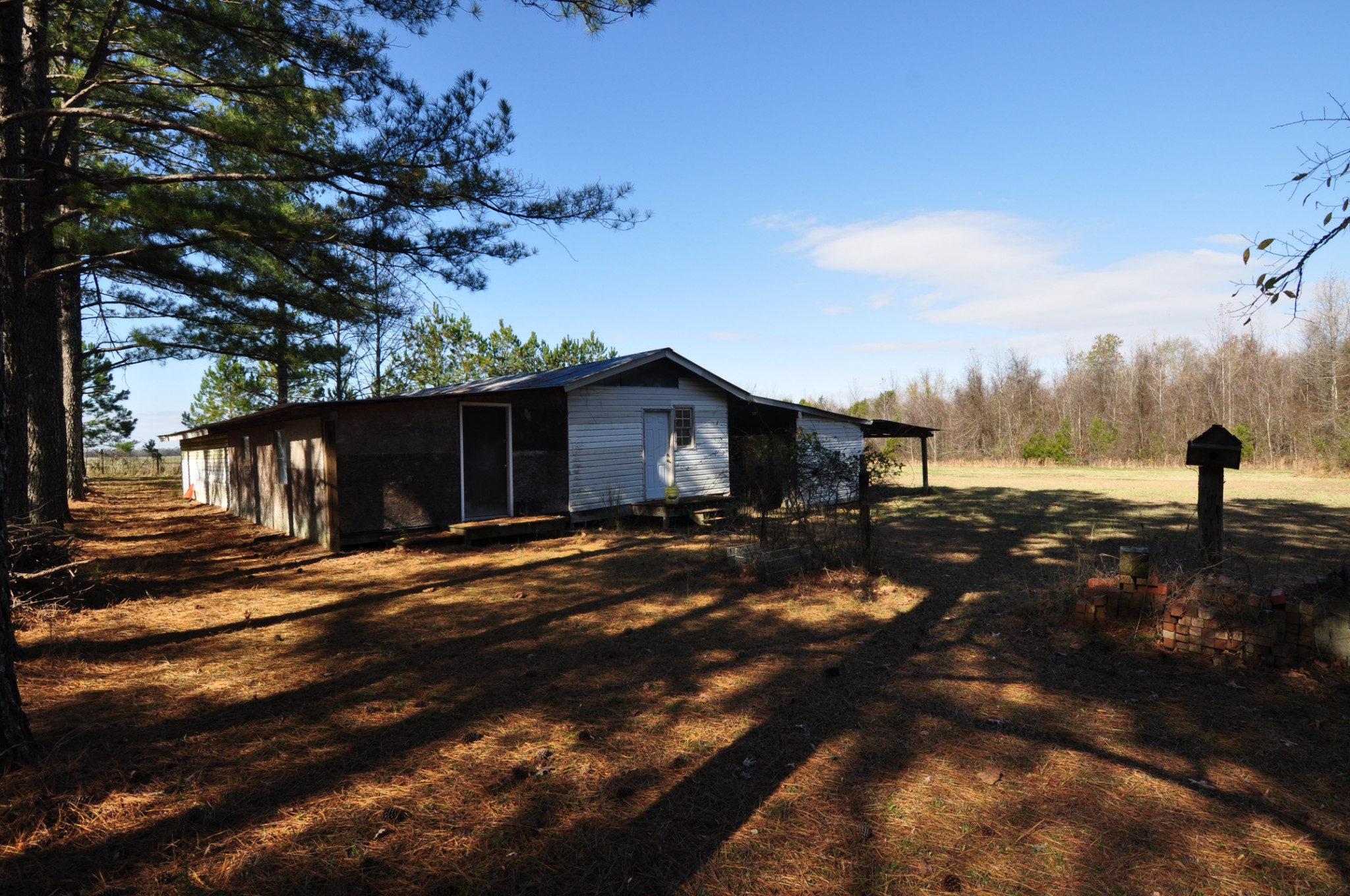 238 Putman Well Road Rockvale, TN 37153 - Photo 15 of 42 a backyard of a house with table and chairs