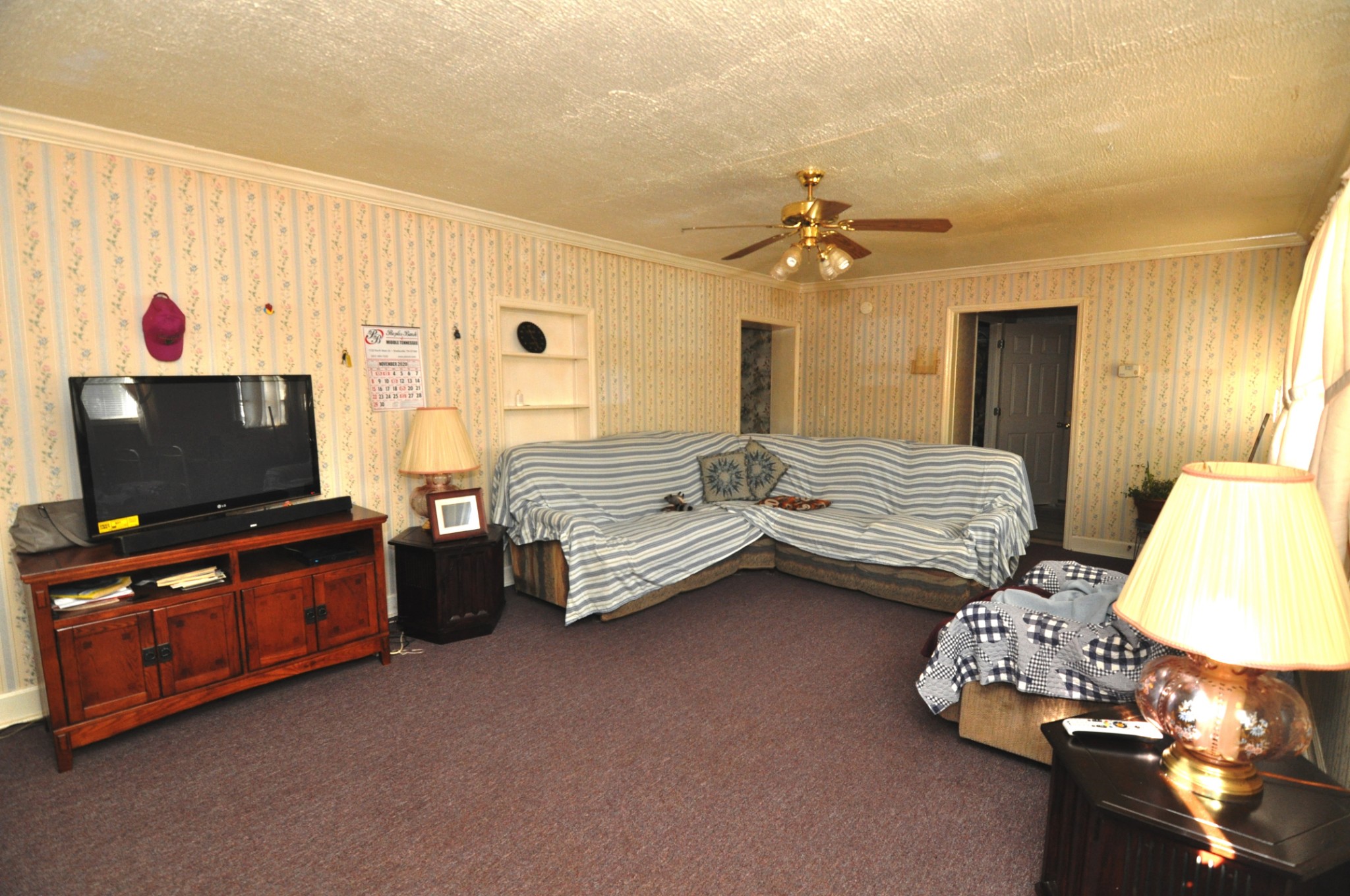 238 Putman Well Road Rockvale, TN 37153 - Photo 3 of 42 a bedroom with furniture and a flat screen tv