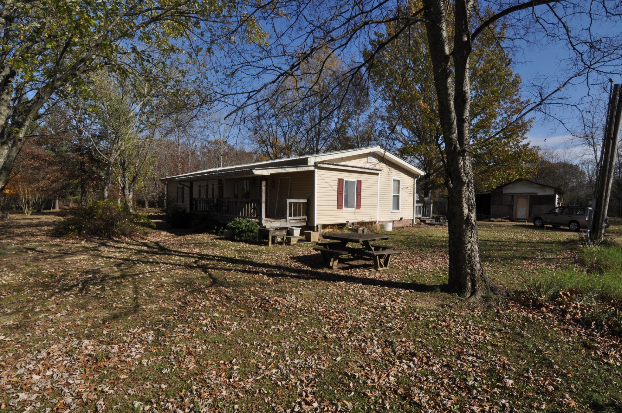 238 Putman Well Road Rockvale, TN 37153 - Photo 26 of 42 a front view of a house with a yard