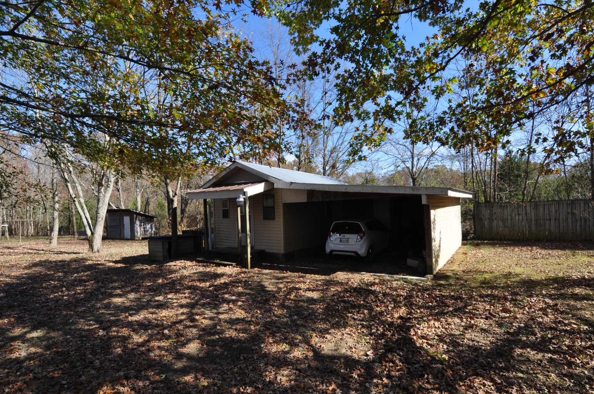 238 Putman Well Road Rockvale, TN 37153 - Photo 32 of 42 a front view of a house with a yard