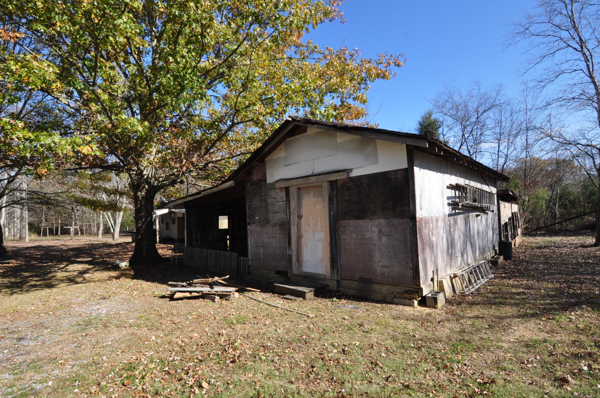 238 Putman Well Road Rockvale, TN 37153 - Photo 34 of 42 a house with trees in the background