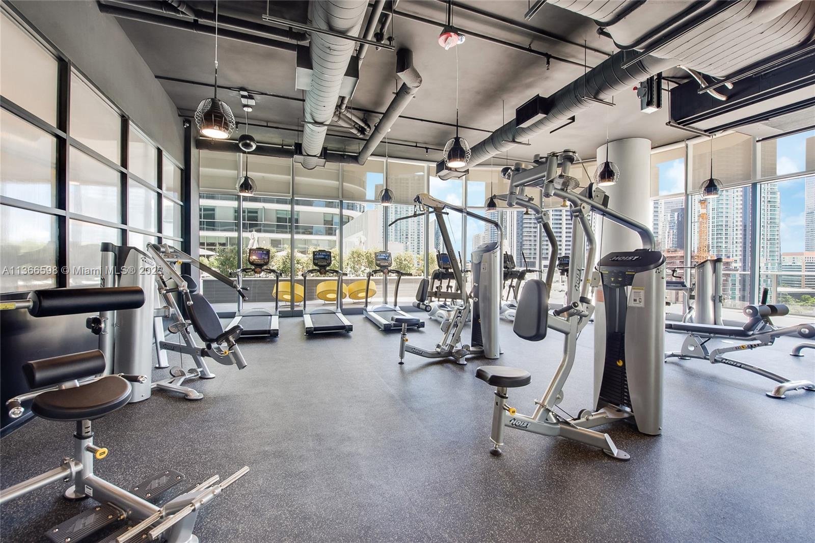 55 Southwest 9th Street, Unit 3607 Miami, FL 33130 - Photo 15 of 22 a view of a room with gym equipment