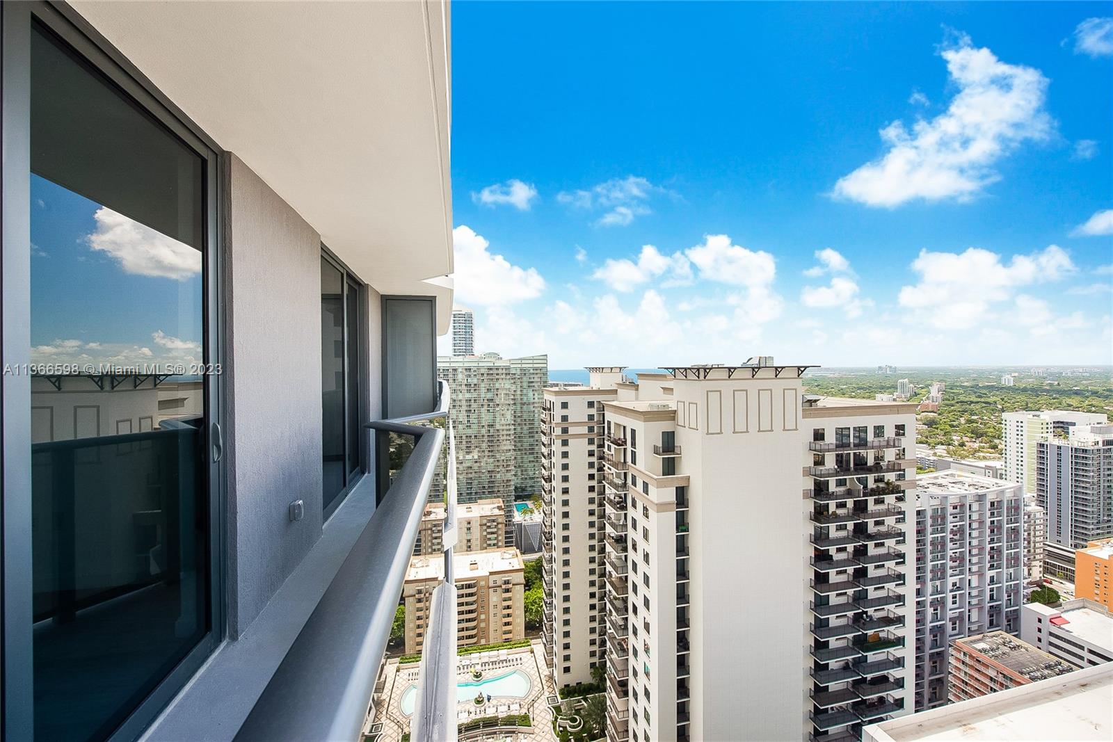 55 Southwest 9th Street, Unit 3607 Miami, FL 33130 - Photo 9 of 22 a view of a balcony with city view