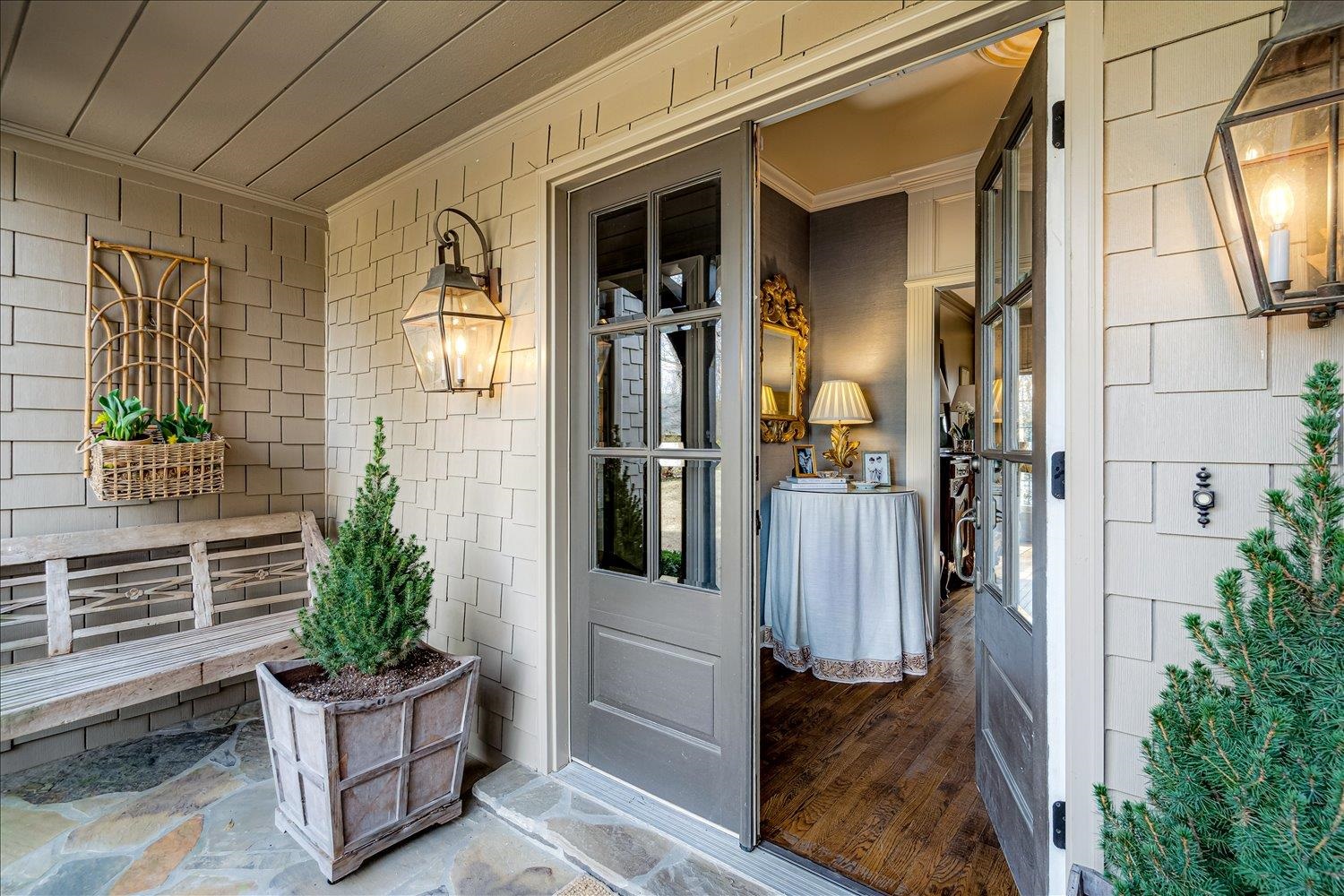 Property entrance with covered porch