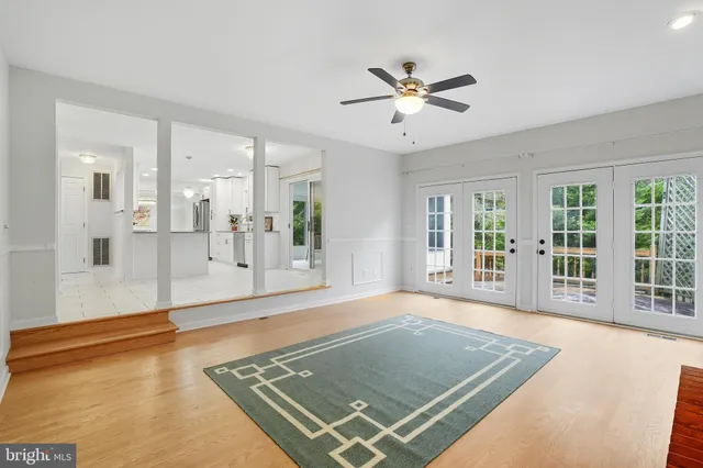 a view of livingroom with fireplace window and a fireplace