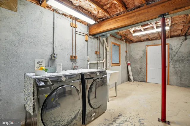 a view of a chairs and table in patio