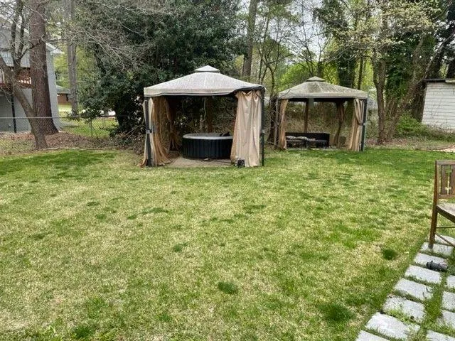 a view of a table and chairs in the patio