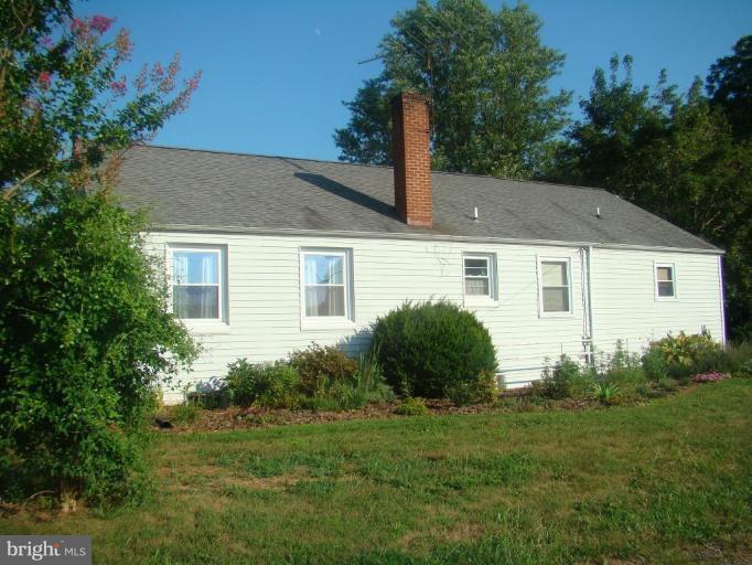 16145 Sheads Mountain Road Rixeyville, VA 22737 - Photo 2 of 20 a view of a house with a backyard