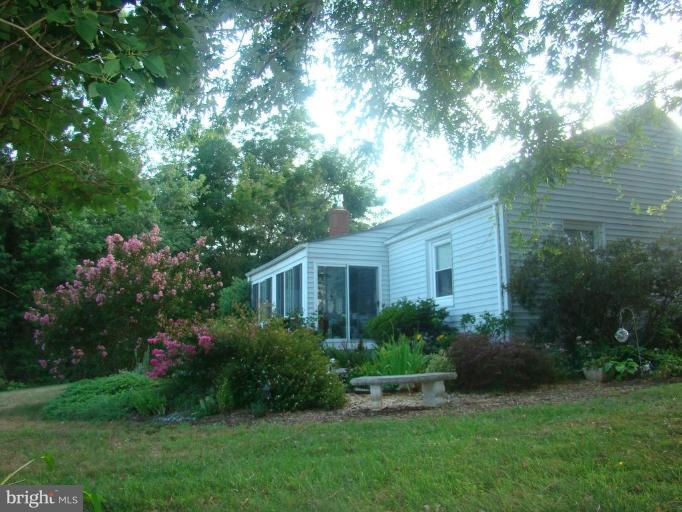 16145 Sheads Mountain Road Rixeyville, VA 22737 - Photo 3 of 20 a view of a house with a garden