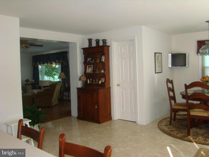 16145 Sheads Mountain Road Rixeyville, VA 22737 - Photo 10 of 20 a living room with furniture and a window