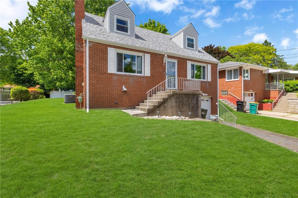 208 Gass Road Pittsburgh, PA 15229 - Photo 1 of 22 front view of a house with a yard
