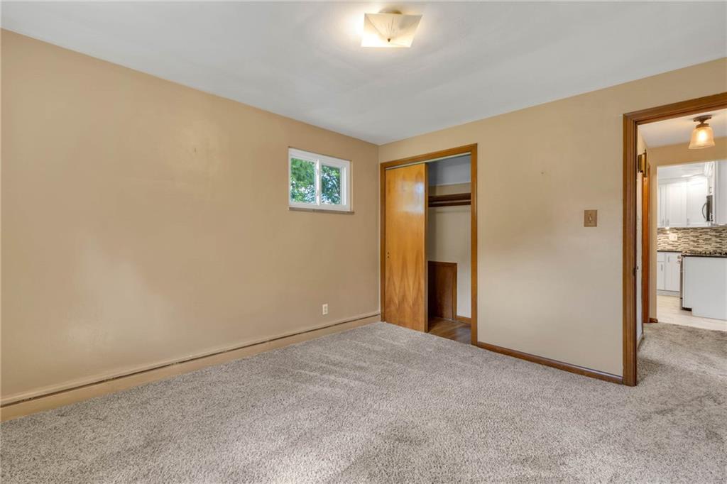 208 Gass Road Pittsburgh, PA 15229 - Photo 14 of 22 an empty room with windows and closet