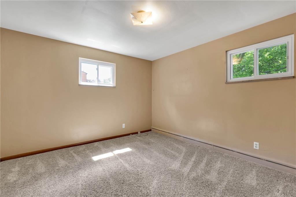 208 Gass Road Pittsburgh, PA 15229 - Photo 17 of 22 an empty room with windows