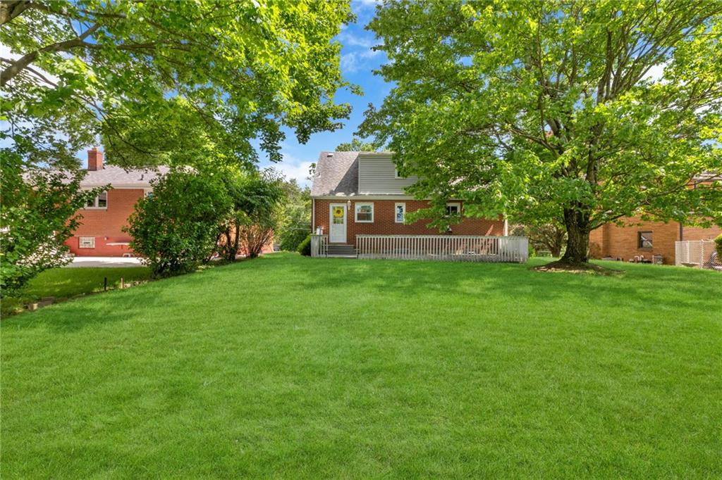 208 Gass Road Pittsburgh, PA 15229 - Photo 3 of 22 front view of a house with a yard