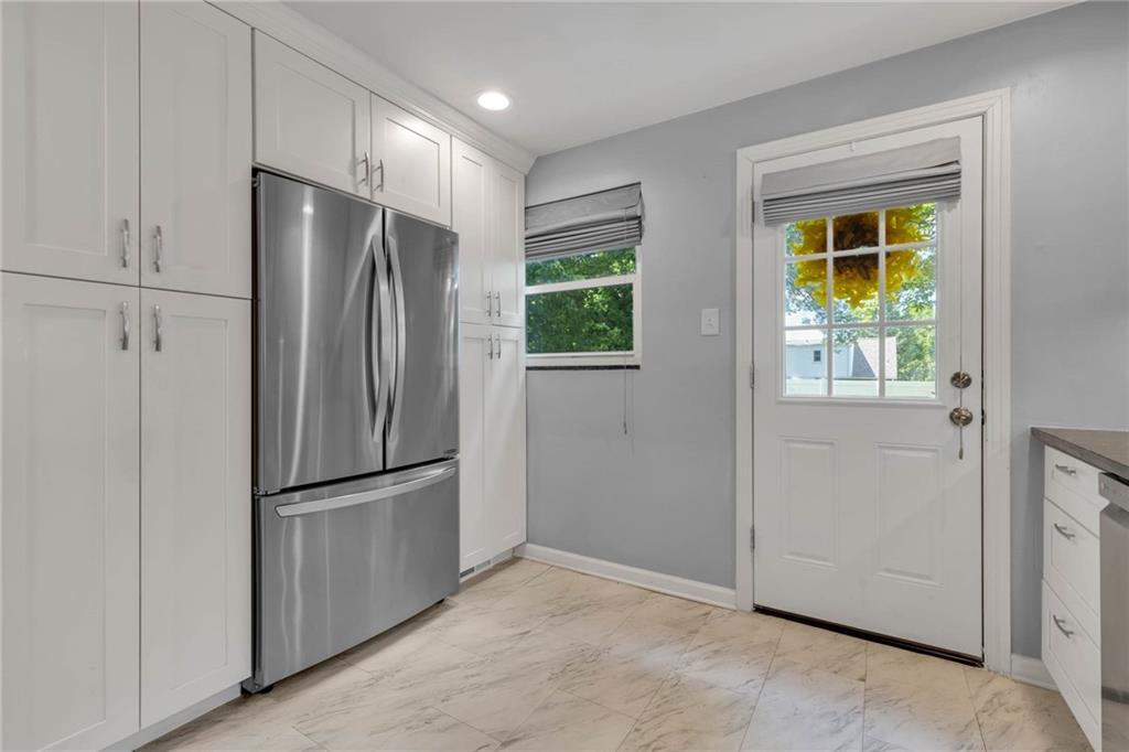 208 Gass Road Pittsburgh, PA 15229 - Photo 8 of 22 a view of kitchen with stainless steel appliances refrigerator and microwave