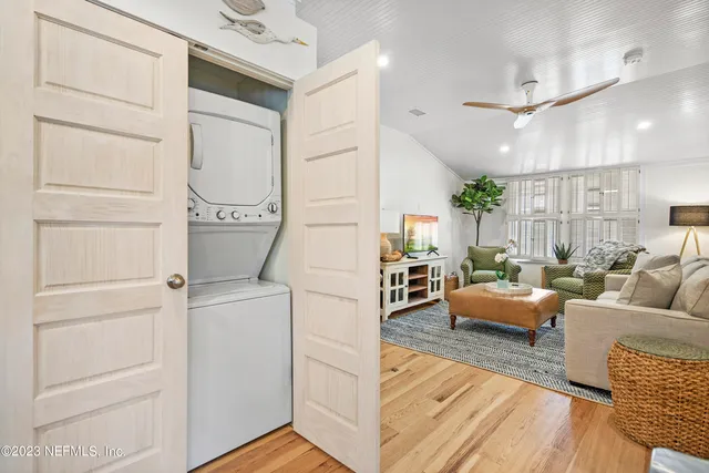 a living room with furniture and a rug