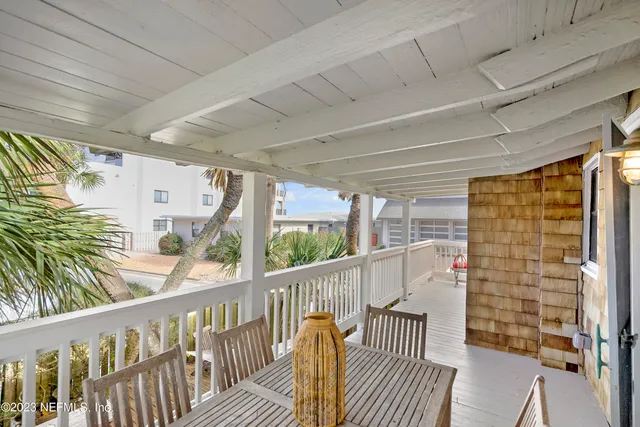 a view of balcony with furniture